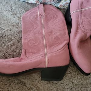 Pink Durango Cowboy boots. I got these on some trip through the Rocky Mountains.
